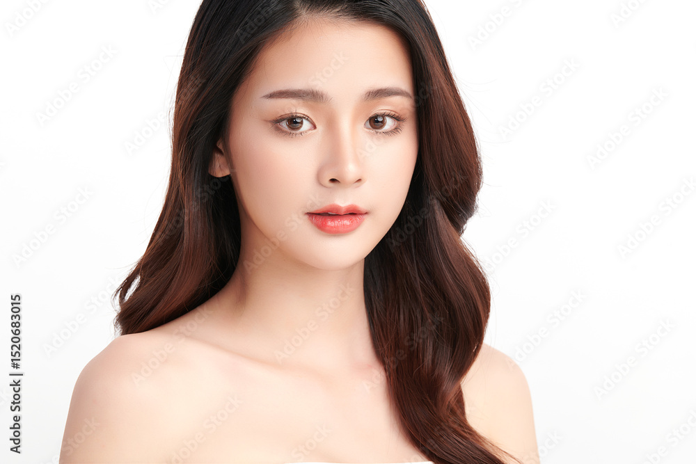 A beautiful young Asian woman with clean, fresh skin against a white background. Skincare, facial treatment, cosmetology, beauty, and spa. An elegant portrait of an Asian woman. A beautiful young Asian woman with clean, fresh skin against a white background. Skincare, facial treatment, cosmetology, beauty, and spa. An elegant portrait of an Asian woman.