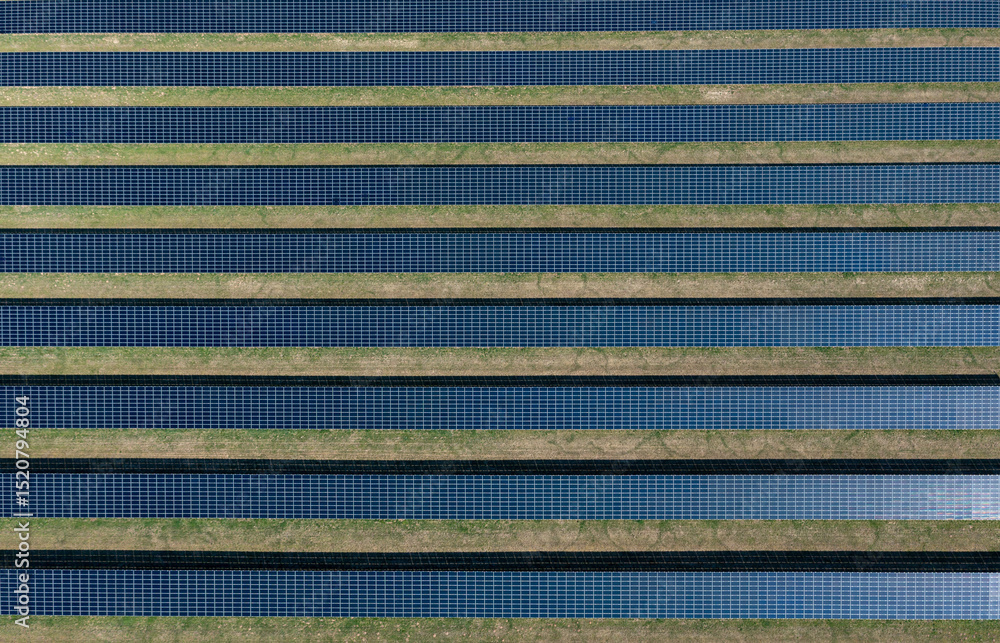 Photovoltaic panels farm in Germany, drone aerial view on a sunny day Photovoltaic panels farm in Germany, drone aerial view on a sunny day