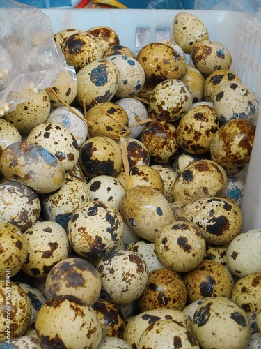 quail eggs on wooden table
