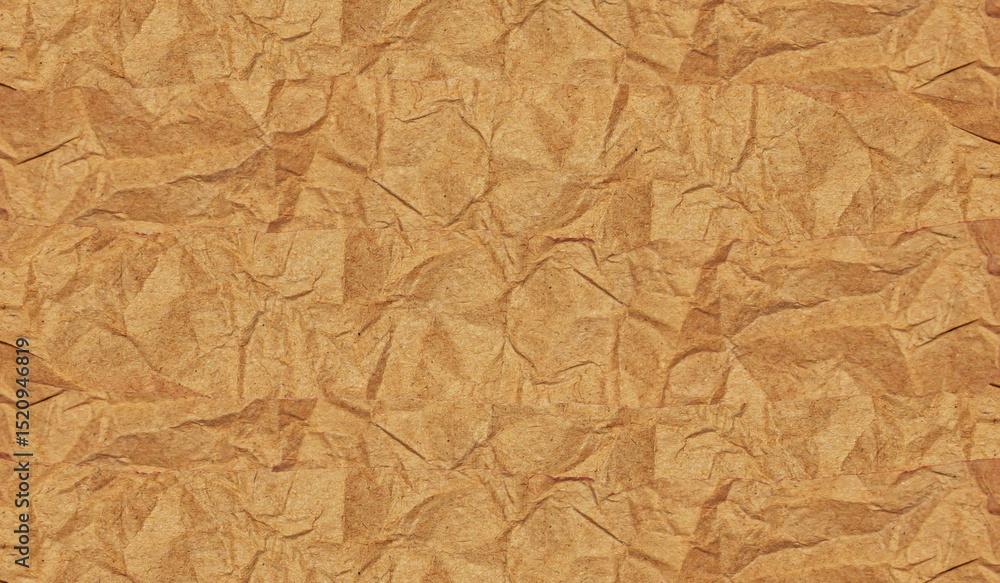 Obraz premium Realistic Crumpled Torn Brown Paper Textured Background for Creative Design.