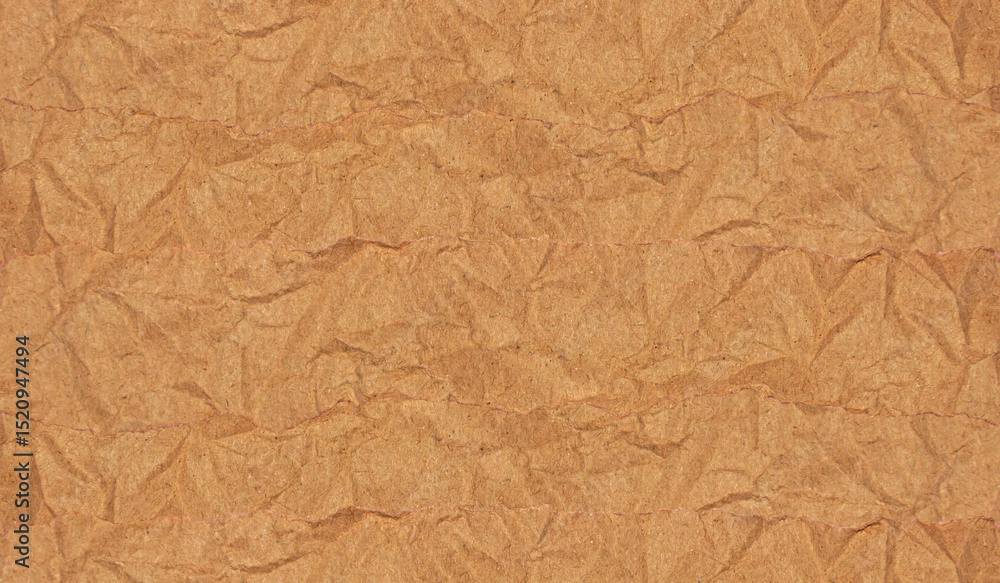 Fototapeta premium Realistic Crumpled Torn Brown Paper Textured Background for Creative Design.