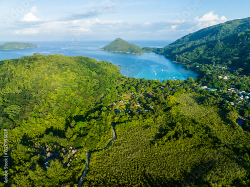 Aerial view of Port Launay Beach and surrounding lush landscape in Mahe, Seychelles
