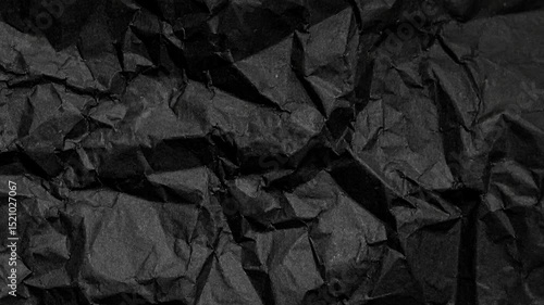 crumpled black paper