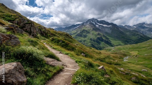 Mountain path through lush valley
