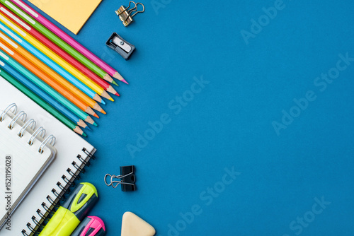 Wallpaper Mural Bright school supplies on a blue background. The back to school concept Torontodigital.ca