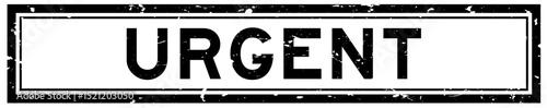 Grunge black urgent word square rubber seal stamp on white bacckground