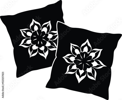 Decorative black pillows with white floral designs suitable for home decor and interior design