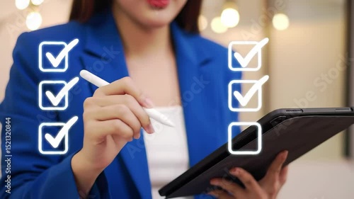Woman in blue jacket filling out digital checklist on a tablet for project management