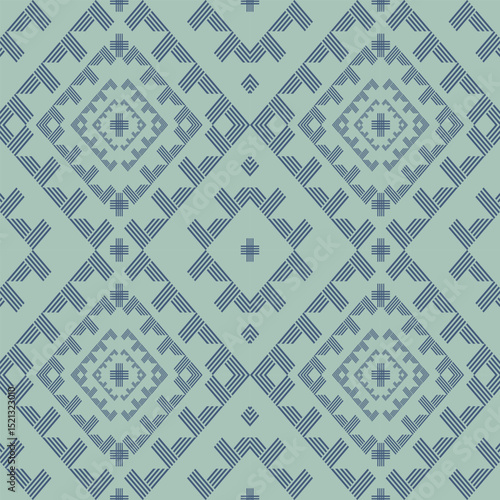 This fabric features a blue-green diamond batik pattern with simple yet orderly geometric motifs, suitable for textile designs seeking a calm and modern aesthetic.