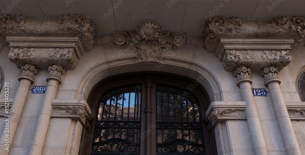 Fototapeta premium Art Nouveau building facade in Barcelona, Spain. Interesting Art Nouveau Architecture Buildings facade in Barcelona, Spain. (Arquitectura modernista). These fancy buildings date for the most from the 