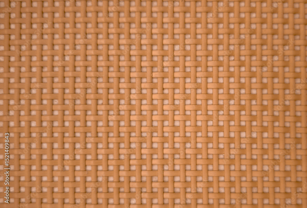 Woven bark texture for furniture. Soft woven bamboo wood texture. Symmetrical straw-beige background fabric. Woven bark texture for furniture. Soft woven bamboo wood texture. Symmetrical straw-beige background fabric.