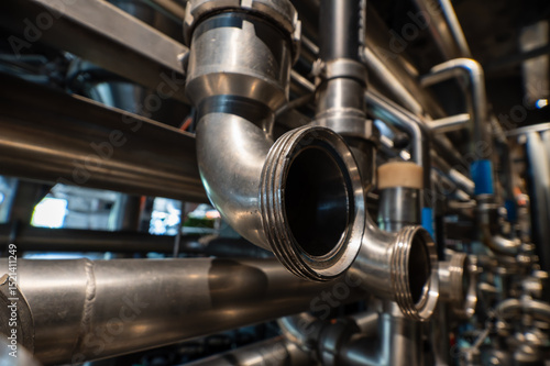 Stainless Steel Industrial Pipe Fittings and Threaded Connections in Manufacturing Equipment