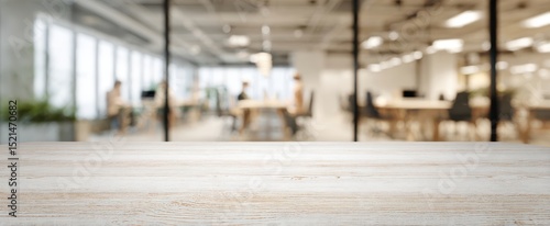 Wallpaper Mural The wooden desk in a bright modern office space with blurred background. Torontodigital.ca
