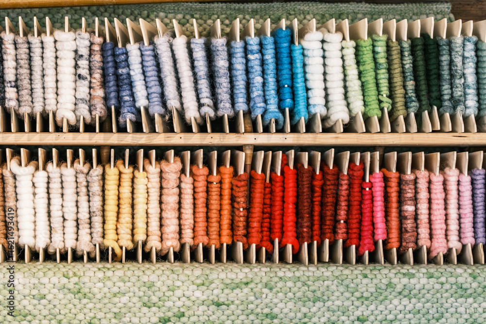 custom made wallpaper toronto digitalColorful yarn spools neatly arranged on wooden shelves in a craft studio showcasing a variety of shades and textures during daylight hours