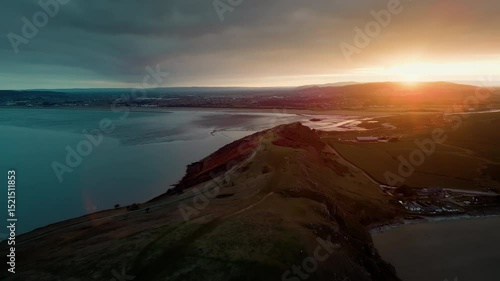 Drone shot along at Brean Down, Burnham-On-Sea, UK at sunrise.