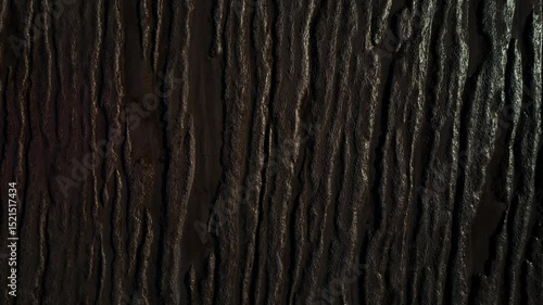 Drone shot revealing rill marks in sandy beach, Burnham-On-Sea, UK.