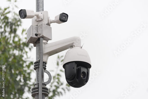 Modern Outdoor Security Surveillance Cameras on Pole for Public Safety and Monitoring.