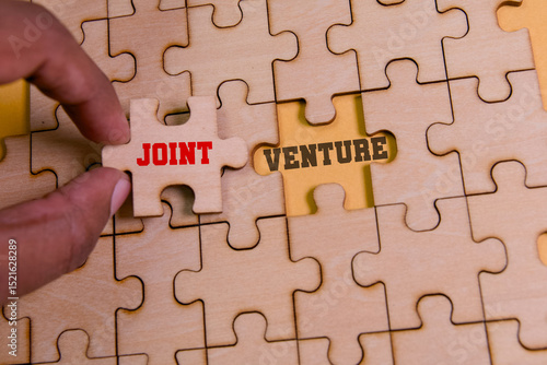 Building partnerships with a joint venture puzzle piece
