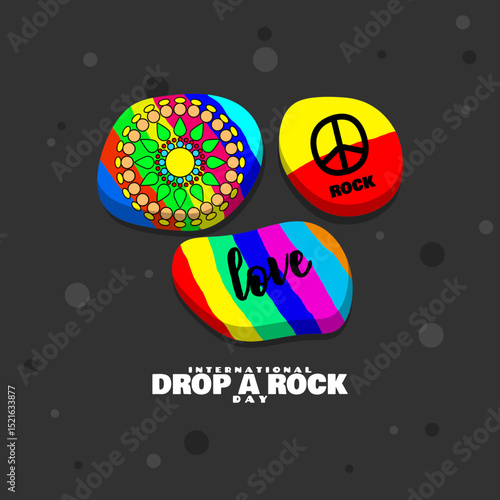 International Drop a Rock Day is celebrated on July 3rd. Natural stones painted and drawn in various colors on a dark gray background.