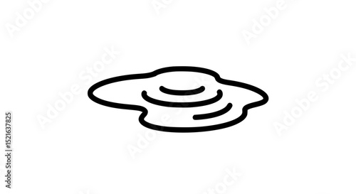 A white egg is cracked and the yolk is spilling out