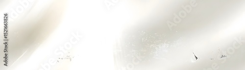 Subtle light and shadow patterns on a smooth surface.