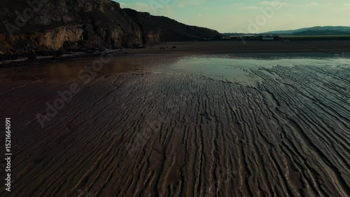Drone shot revealing rill marks in sandy beach, Burnham-On-Sea, UK.