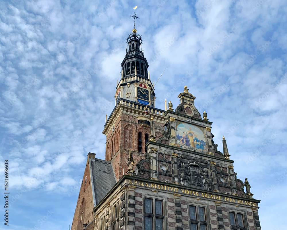 Fototapeta premium Dutch Renaissance Tower Under Blue Skies Alkmaar
