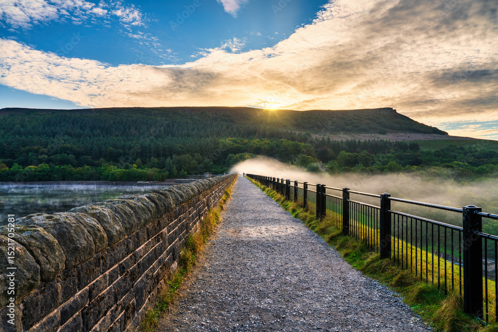Fototapeta premium Morning mist over Ladybower dam in Peak district. United Kingdom 