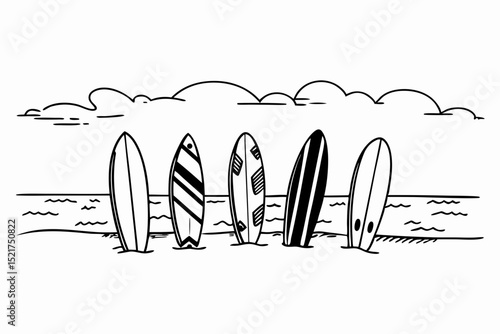 Surfboards standing in sand by the ocean with clouds in the background  