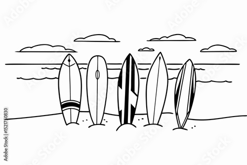 Surfboards standing in sand by the ocean with clouds in the background  