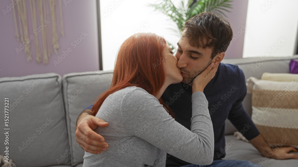 Couple kissing on a sofa indoors, depicting a loving relationship between a man and woman in an intimate home setting with cozy decor and natural light. Couple kissing on a sofa indoors, depicting a loving relationship between a man and woman in an intimate home setting with cozy decor and natural light.