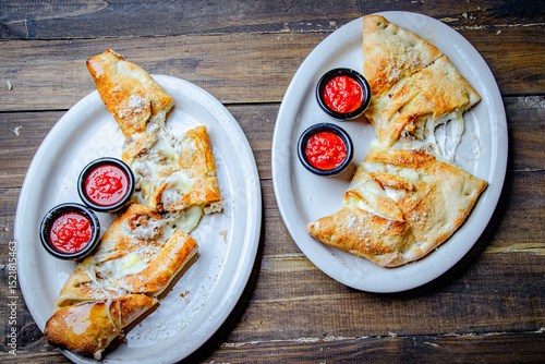 italian calzone stuffed with cheese and pepperoni.