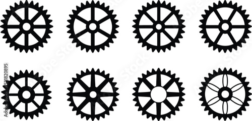 A collection of eight black gear icons with varying spoke and tooth designs
