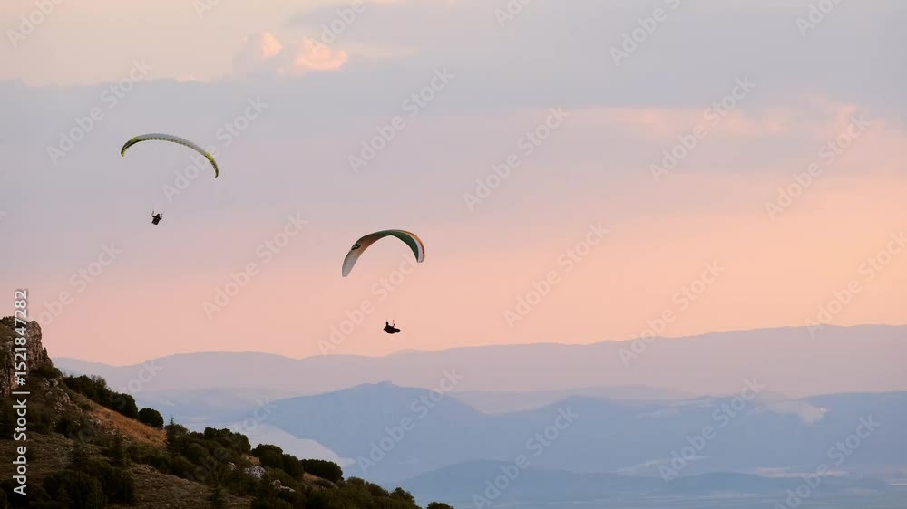 Solo Paraglider Flying at Paragliding Festival – Aerial Sports Moment Solo Paraglider Flying at Paragliding Festival – Aerial Sports Moment