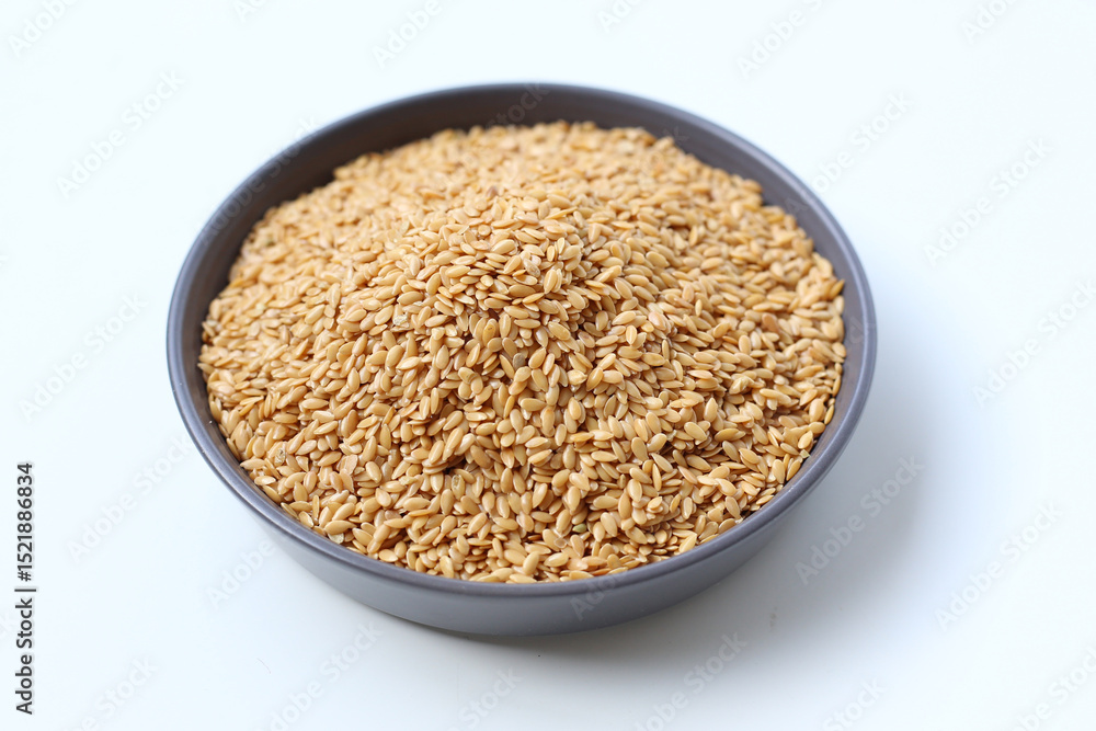 Organic golden flaxseeds, rich in omega-3, fiber, and antioxidants Organic golden flaxseeds, rich in omega-3, fiber, and antioxidants