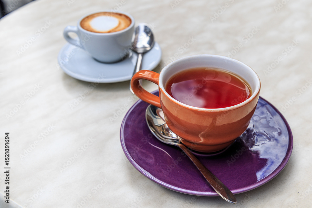 Cup of mocha coffee and a cup of tea Cup of mocha coffee and a cup of tea