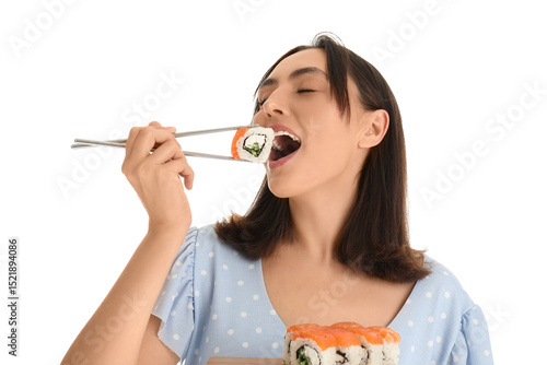 Happy young woman eating su...
