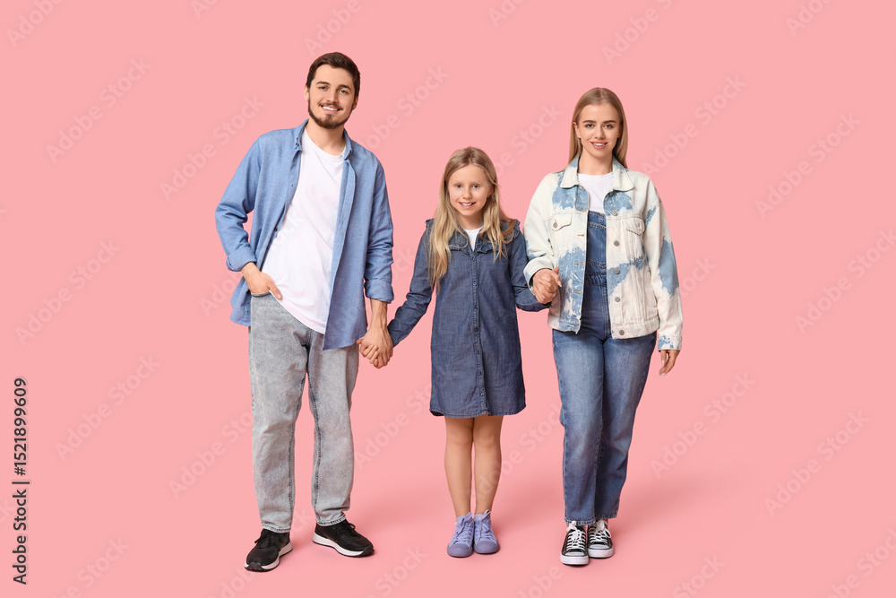 Obraz premium Happy family in stylish denim clothes on pink background