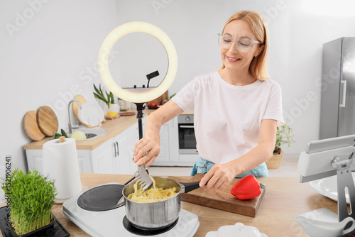 Female food blogger boiling...