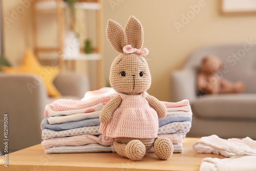 Toy bunny with stack of bab...