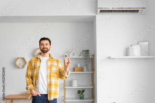Young man with air conditio...