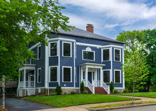 Obraz na płótnie Elegant two-story Colonial Revival house with manicured lawn in Newton, Massachu