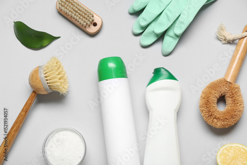 Photos Composition with natural products and supplies for cleaning on grey background
