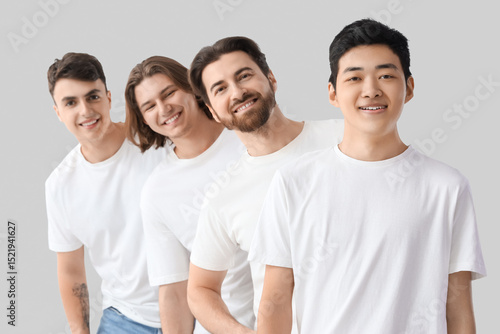 Group of young men in white...