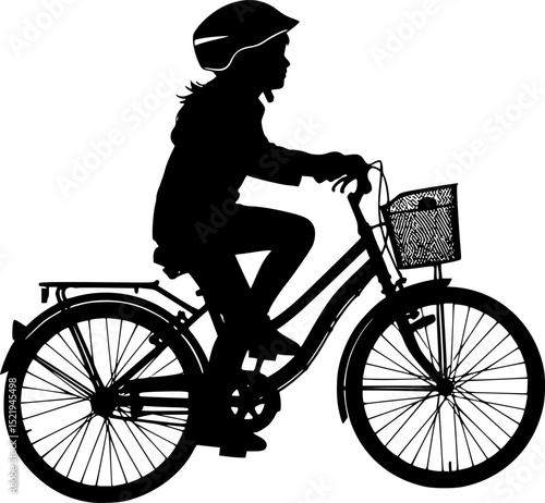 Silhouette of a kid riding a bicycle with helmet
