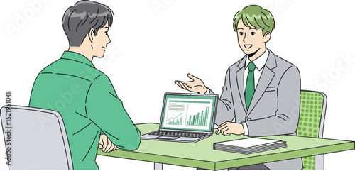 ノートパソコンで仕事をするスーツを着た男性