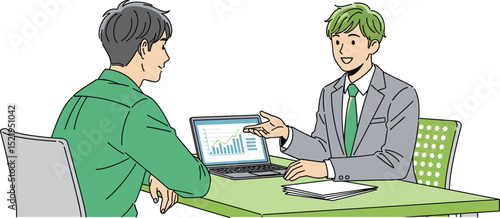 ノートパソコンで仕事をするスーツを着た男性