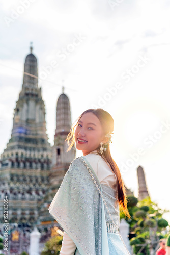 Photography Young Woman in Traditional Thai Costume at Wat Arun, Temple of Dawn, Bangkok, Th