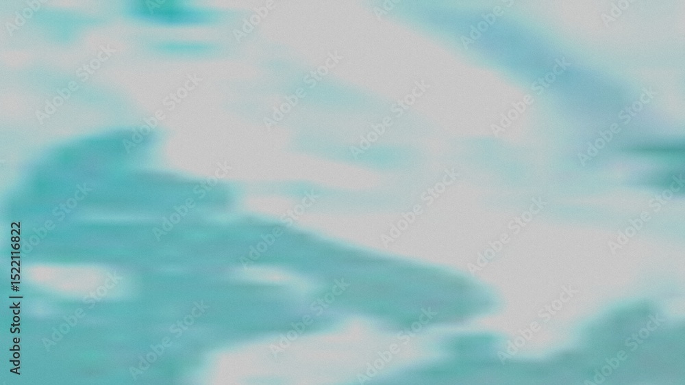 Obraz premium A soft, blurry image featuring a blend of teal and gray tones. The colors transition smoothly, creating a calming and ethereal effect.