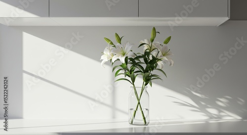 Lilies in Glass Vase on Countertop with Sunlight